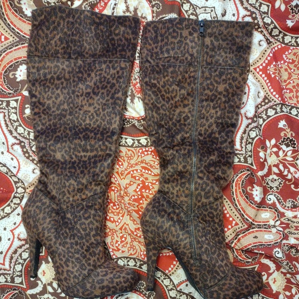 Just Fab: Leopard print platform 3.5 inch heeled boot. Size 10